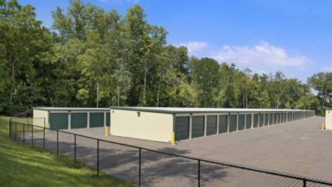 Fence and outdoor units at Mini Storage Depot on Eastern Avenue.